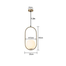 Load image into Gallery viewer, Tierralta floor lamp Model D close-up of gold frame and ball junction