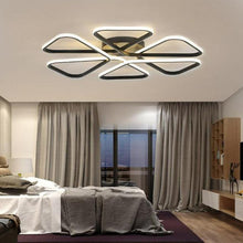 Load image into Gallery viewer, Conde flower-shaped LED ceiling light, illuminated petal design, room setting