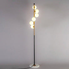 Load image into Gallery viewer, Duitama floor lamp frosted glass shades detail, showing warm LED glow