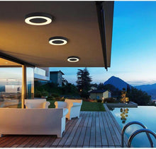 Load image into Gallery viewer, Miramar ceiling spotlight mounted on pergola ceiling, illuminated at night
