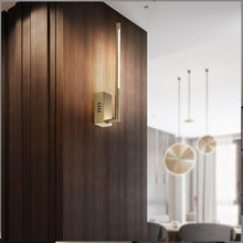 Load image into Gallery viewer, Fazenda Rio Grande LED wall light in black, art deco design, illuminated