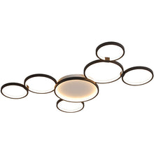 Load image into Gallery viewer, Novas multi-ring LED ceiling pendant, illuminated rings in warm white, room setting