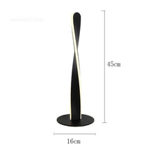 Load image into Gallery viewer, Munro floor lamp in situ in modern living room, showing full H130cm height