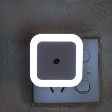 Load image into Gallery viewer, Mini LED night light, installed in socket, warm white glow
