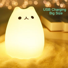 Load image into Gallery viewer, Silicone cat LED night light, size comparison with hand
