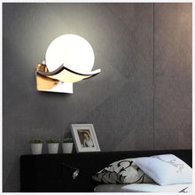 Load image into Gallery viewer, Itacoatiara moon-shaped LED wall light in gold, W18cm H18cm, front view
