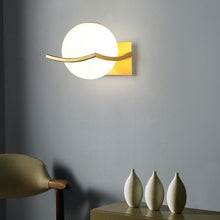Load image into Gallery viewer, Itacoatiara moon-shaped LED wall light, chrome finish, room setting

