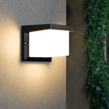 Load image into Gallery viewer, Manzanillo outdoor LED box wall light in aluminium, front view, mounted beside front door

