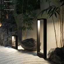 Load image into Gallery viewer, Zacatecas outdoor wall light illuminated at night on garden path
