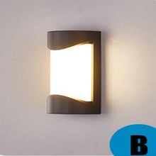 Load image into Gallery viewer, Navojoa outdoor LED wall light close-up showing polycarbonate diffuser and LED source
