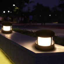 Load image into Gallery viewer, Minatitlán square spotlight mounted on exterior wall, illuminated at night
