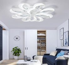 Load image into Gallery viewer, Valbom flower-shaped LED ceiling light, illuminated petals, room setting
