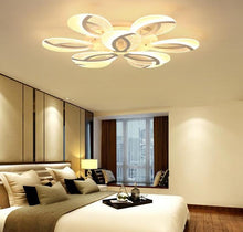 Load image into Gallery viewer, Valbom LED ceiling light, petal detail close-up, warm white glow
