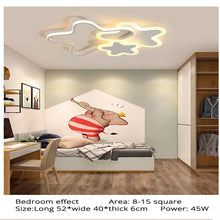 Load image into Gallery viewer, Pink Hearts LED ceiling light, installed in nursery, warm pink glow

